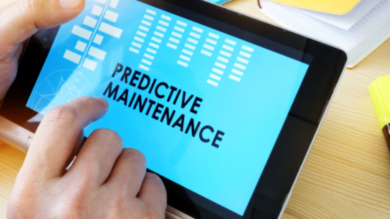Man,Holding,Tablet,With,Title,Predictive,Maintenance.